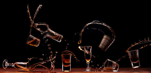 Various shots of liquor splashing