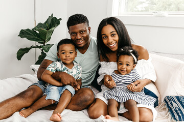 A beautiful / adorable African American family of four.