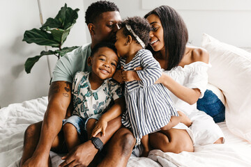 A beautiful / adorable African American family of four.