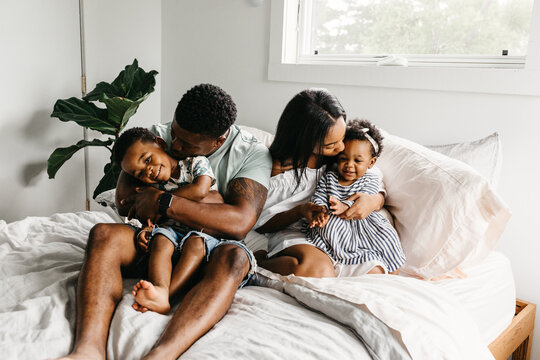 A beautiful / adorable African American family of four.