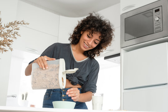 Ethnic woman preparing healthy breakfast at home