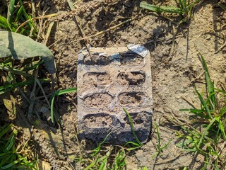 dirty and empty plastic packaging from pills on the street
