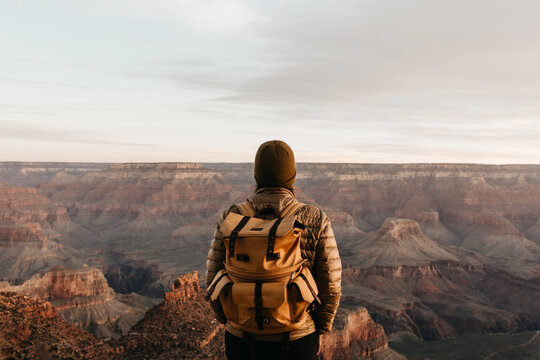A woman looking out towards the Grand Canyon
