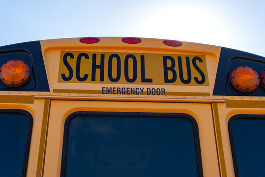 Emergency Door On The Back Of A Yellow School Bus