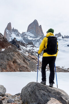A hiker arrives to the base of Laguna de los Tres in El Chalten, Patagonia, Argentina