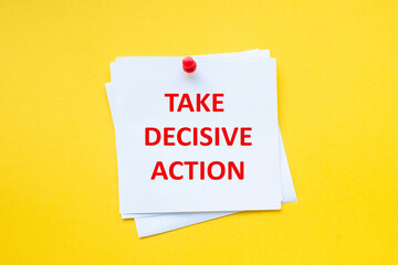 Word take decisive action on white sticker with yellow background