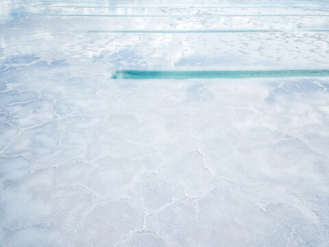 Water pools on a salt flat