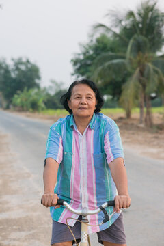 Grandmother riding bicycle