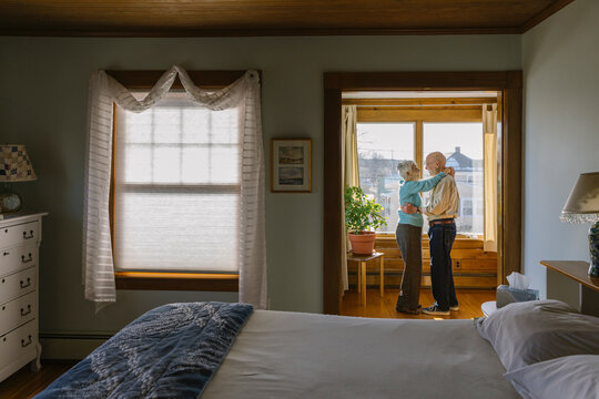 Senior Citizen Couple Dancing at Home - Powered by Adobe