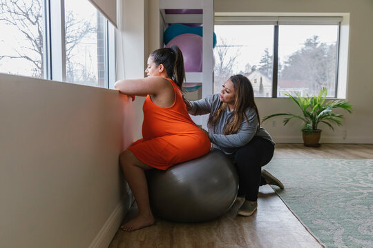 Doula Working with Expecting Mother at Home