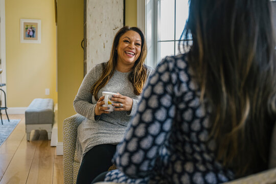 Doula Meeting with Expectant Hispanic Woman at Home