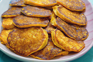 Platter of vegan pumpkin pancakes in the fall