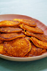 Platter of vegan pumpkin pancakes in the fall