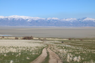 Looking down at Antelope Island and snowcapped Wasatch range beyond from Sentry loop trail, Antelope Island State Park, Utah