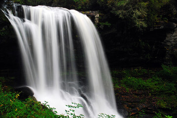 Fototapeta premium Dry Falls in the Nantahala National Forest in North Carolina creates a serene scene
