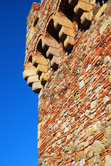 A stone wall of a castle that was reconstructed on a winery © kirkikis