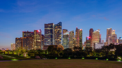 Fototapeta na wymiar Wide panorama image of Singapore skyscrapers at magic hour.