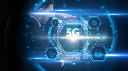Business, Technology, Internet and network concept. Young businessman working on a virtual screen of the future and sees the inscription: 5G