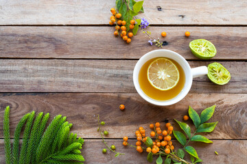 herbal healthy drinks hot honey lemon health care for cough sore with lemon slice of lifestyle relax arrangement flat lay style on background wooden