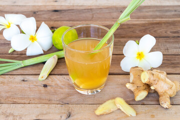 hot ginger water herbal healthy drinks health care for cough sore with ginger slice, lemongrass,...