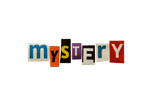 The word MYSTERY formed with newspaper cutout on white paper background. Letters from newspaper clippings forming the word MYSTERY. Concept for mysteries, suspense and crime thriller genre.
