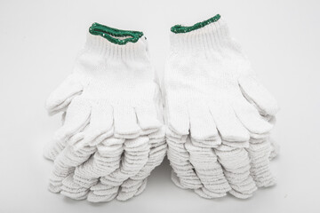 White cloth gloves for construction work on white background