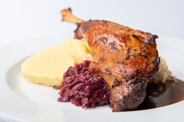 Grilled goose/duck leg with dumplings and cabbage