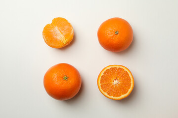 Flat lay with ripe mandarins on white background