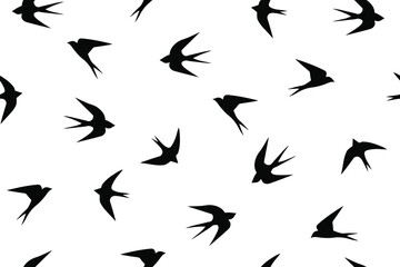 Obraz na płótnie Canvas Swallows. Black birds on a white background. Seamless Vector Illustration