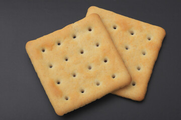 Two square biscuit cookies