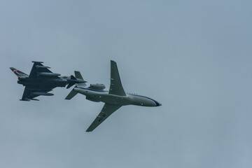jet close a plane at a air show