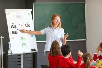 Teacher conducting lesson in classroom