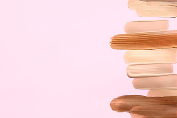 Samples of foundation for makeup on color background