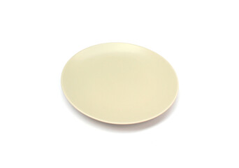 Empty ceramics white plate isolated on white background with clipping path