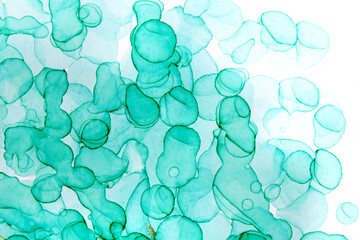 Alcohol ink green and gold abstract background. Bubble watercolor texture.