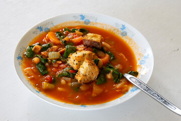 Homemade Ribollita, tuscan bean soup with seed & grains sourdough