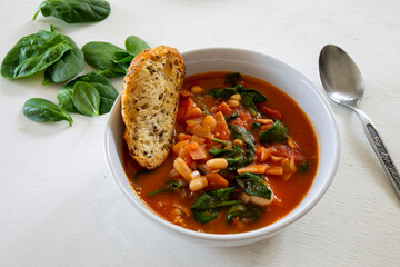 Homemade Ribollita, tuscan bean soup with seed & grains sourdough