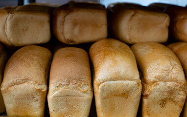 Loaves of bread on the counter of the store.
