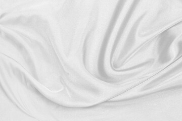 Smooth elegant white silk fabric or satin luxury cloth texture can use as wedding background. for drapery luxurious abstract design
