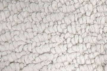 Close up of carpet texture. White carpet fibers in multi level loop pile style, known to be durable...