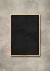 Traditional black board isolated on a concrete background