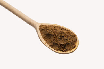 Mix spices on wooden spoon isolated.