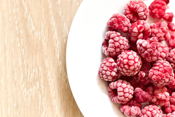 Maliny na talerzu. Sweet Raspbeery on the plate © Jakub
