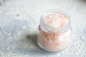 Glass jar with pink himalayan salt