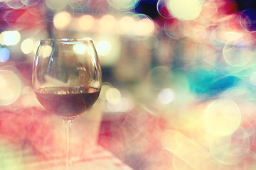 evening in a restaurant, blurred abstract background, bokeh, alcohol concept, wine glasses in a bar