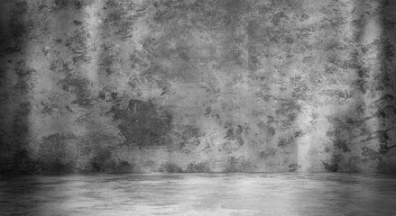 empty room with a concrete wall, gray background. Room for studio.