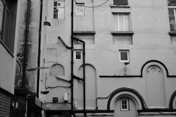 Inner courtyard building in black and white with geometrical forms