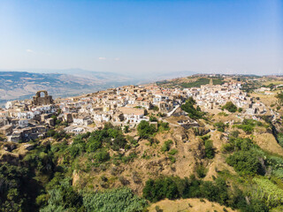 Fototapeta na wymiar Grottole, Matera, Basilicata, Italy: landscape of the old town on the hill and the countryside