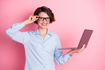 Portrait of her she nice attractive glad cheerful cheery brown-haired girl manager holding in hands...