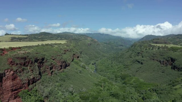 South Kauai Hanapepe Valley Lookout drone view. Aerial lifting panorama rising shot of canyon on picture perfect sunny day